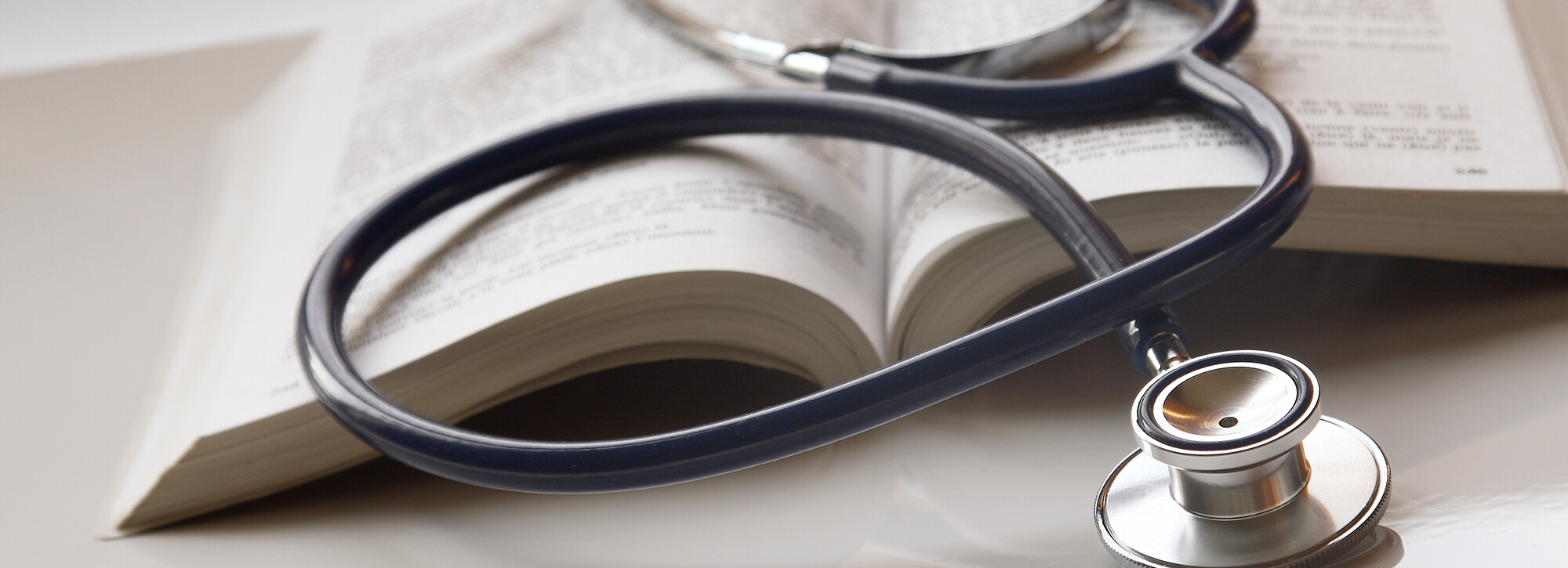 stethoscope and book