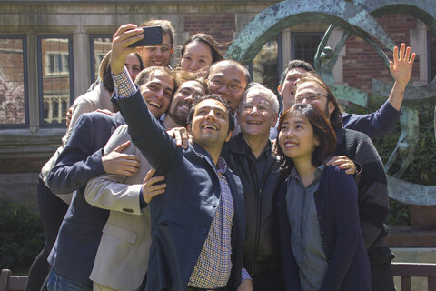 Former Dean Robert C. Post poses for a group photo
