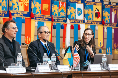 Professor Oona Hathaway speaking on a panel at a conference in Lviv, Ukraine