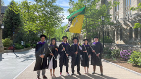 students with the Yale Law School flag